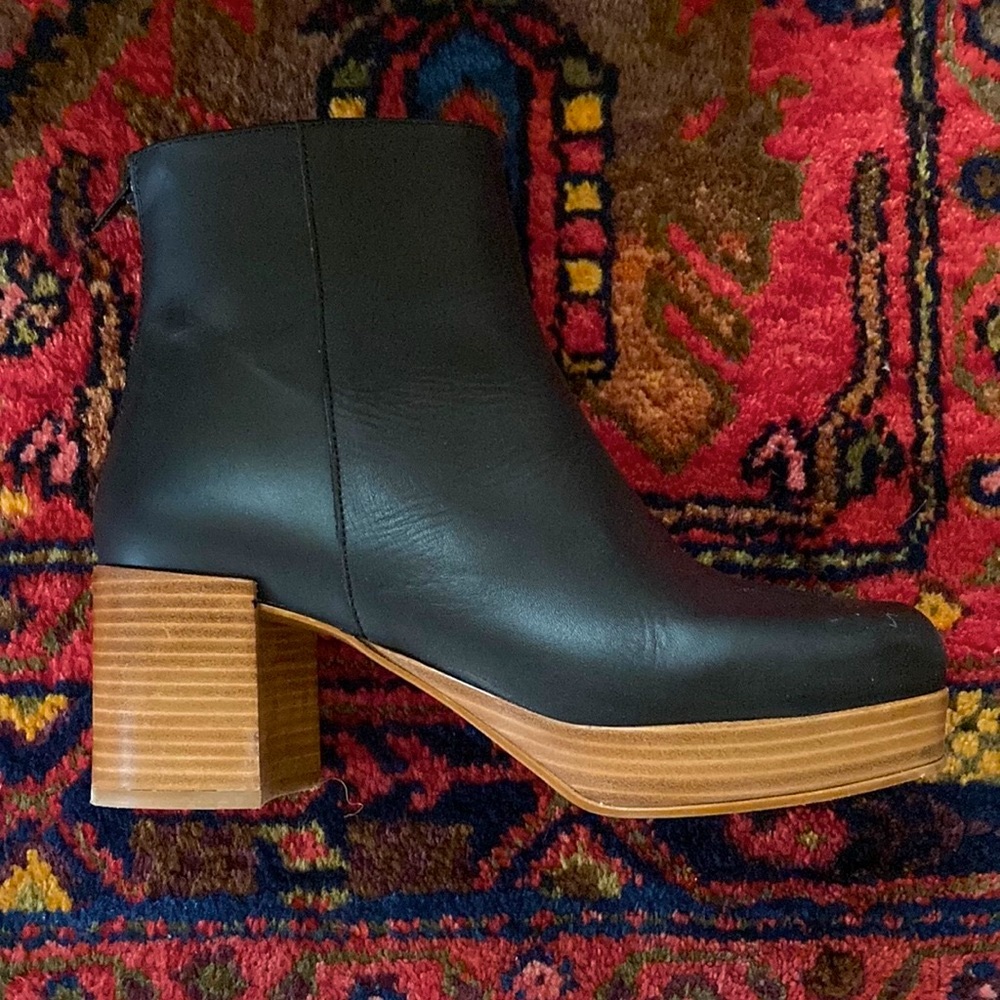 Intentionally Blank black Speed platform boots.